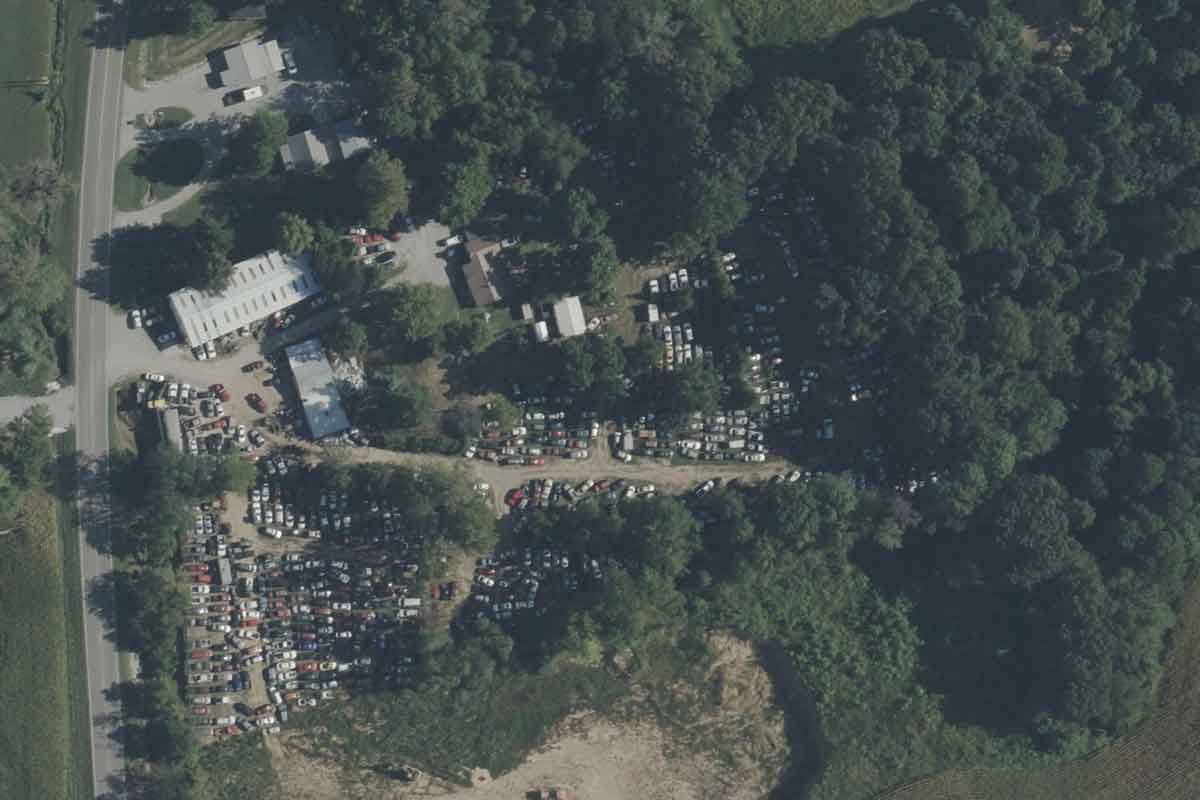 Drone view of Don Phillips Auto Salvage at 608 KY-81, Calhoun, KY 42327